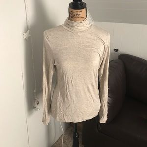 Cream Cling fit turtle neck